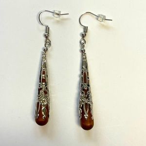 Wooden teardrop bead in silvery scrolled cap. 1.75” lightweight. NIP.  2 avail